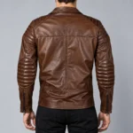 Back view of a men's rich brown leather biker jacket with ribbed elbow pads, quilted shoulders and zipped cuffs