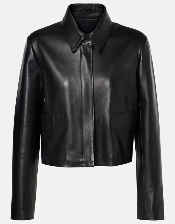 womens black cropped leather jacket 1 Women's black lambskin cropped jacket laid flat, front view, with a spread shirt collar, concealed placket and flap pockets