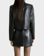 Back view of the women's boxy black lambskin cropped jacket, showing the square-cut hem and plain back panel