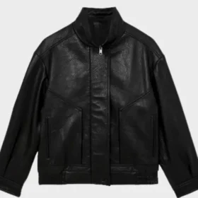 Women's oversized black grained leather bomber laid flat, front view, with a funnel neck, front zip and gathered elastic hem