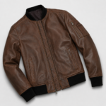 Men’s Alden cognac brown lambskin leather bomber jacket front close view with black rib-knit collar, cuffs, hem and sleeve zip pocket