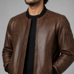 Men’s Alden cognac brown lambskin leather bomber jacket close view with black rib-knit collar, cuffs, hem and sleeve zip pocket