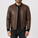 Men’s Alden cognac brown lambskin leather bomber jacket front view with black rib-knit collar, cuffs, hem and sleeve zip pocket