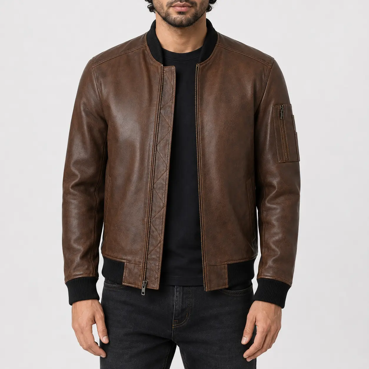 Men’s Alden cognac brown lambskin leather bomber jacket front view with black rib-knit collar, cuffs, hem and sleeve zip pocket